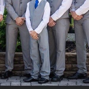 Boys dress pants, vest, long sleeve dress shirt.